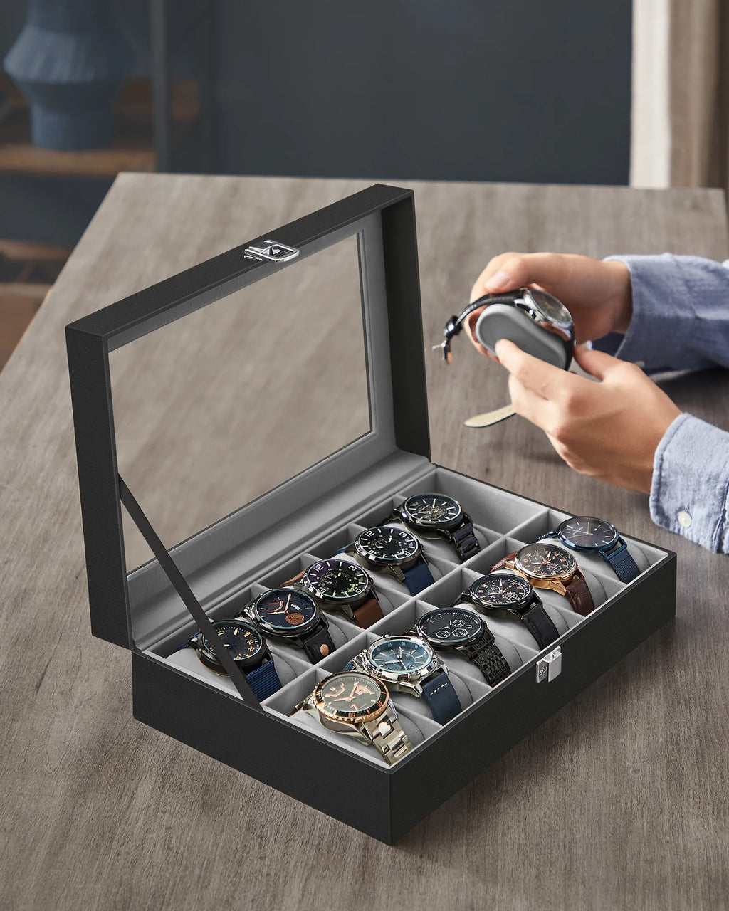 SONGMICS Watch Box with 12 Compartments, High-Quality PU Material, Soft Velvet Lining, Metal Closure, Transparent Glass Lid for Easy Access, Ideal for Watch Lovers and Storage Organization, Dimensions 20.2 x 30.2 x 7.8 cm.